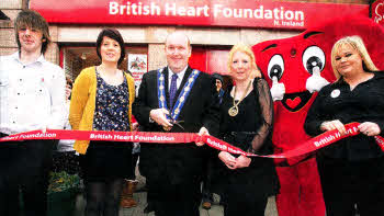 Then Deputy Mayor Councillor William Leathem with Heart Foundation Shop Bow Street staff Lawrence Morrison, Danielle Morris Assistant Manager, Samantha Robinson Manager, Mascot Hearty and Ashlene Baizell at the opening of the shop in March. US1212127A0 