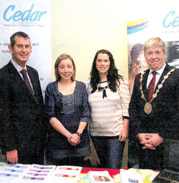 Claire Bradley and Carrie Anne Rainey of The Cedar Foundation pictured with Minister of Health Edwin Poots and Lisburn Mayor Brian Heading at 'Disability - Challenges and Change' at Lagan Valley Island. US0812-104A0