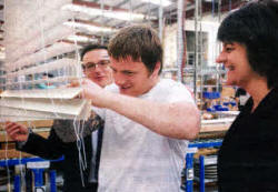 Alistair Speer of Decora, employee Mark McCutcheon and Enterprise Minister Arlene Foster. US1712.108A0