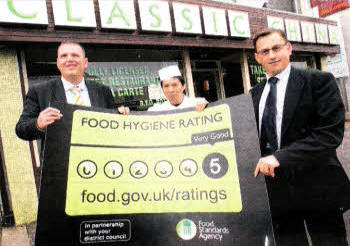 Pictured outside Classic China which has achieved a 5 rating for its food hygiene under the Food Hygiene Rating Scheme, and inspected by Lisburn City Council, are Cllr Andrew Ewing, Chairman of the Environmental Services Committee; Mr Robert Lamont, Food Safety Officer, Lisburn City Council and Mr Lin, Proprietor of Classic China.