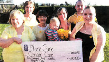 Jeannie Robinson with some of the helpers Carol Hewitt, Lila West, Rachel Hewitt, Brendan McAuley and Lisa Robinson when she held a 'Drop in Coffee Day' on Pancake Tuesday in aid of Marie Curie Cancer Care. Also included is Aimee Robinson holding a bunch of daffodils, the symbol of Marie Curie.