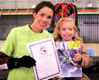 Michelle Laverty with her daughter Poppy after completing a sky dive to raise money for Asthma UK