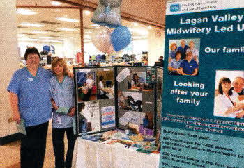 Midwife Winnie Chambers and support worker Caroline Wallace manning the information stand.