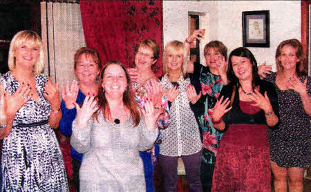 Patricia Byrne shows off her nails at the Nail and Wine party at her Derriaghy Road home. Others at the party were Karen Wishart, Ann Mc Avoy, Patricia Byrne, Carole Briggs, Sarah Muldoon, Shauna Bradley, Lesley Neill and Angela Mervyn.