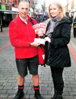 Dan McAlinden presenting a cheque to Jan Beaumont of the MG charity.US0612- 109A0