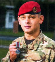  Lance Corporal Robert Baxter, 20, with his Afghanistan medal.
