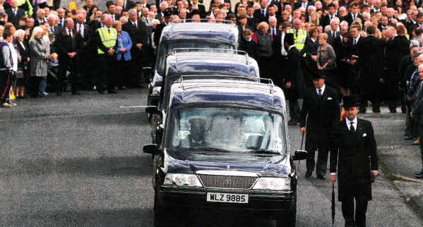 The funeral cortege of Noel Spence and his two sons Graham (30) and Nevin (22) at Ballynahinch Baptist Church, who died in an farming accident on Saturday evening. Brian Little/ Presseye