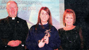 Winner of the Bartley Trophy for top GCSE student Ciara Rogan with PP Fr Murray and Principal Imelda Jordan