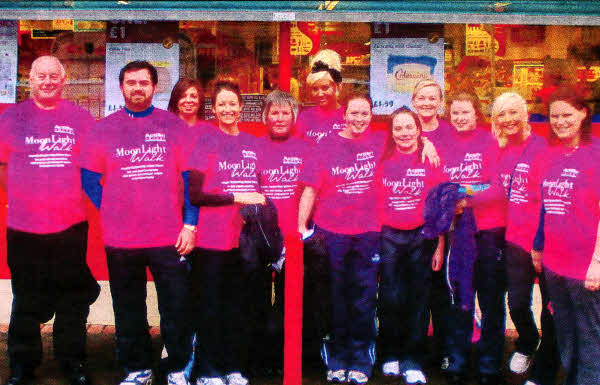 Eddie Poole, owner Poole's SuperValu Moira, with the SuperValu team ready to take on the Action Cancer Moonlight Walk