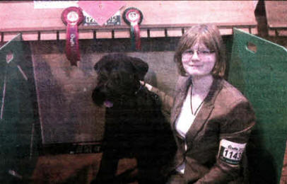 Emma Willis with Irish Champion Jannem Boy George, 'George' a Giant Schnauzer from Lisburn who won a first at Crufts in the Good Citizen Dog class. Emma and her mother Angela's other schnauzer 'Zev' Jannem Munire was first in the Limit Bitch class.