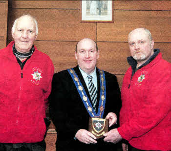 The Deputy Mayor of Lisburn, Alderman William Leathem made a presentation to Geordie Spence and Bert Smith, MBE when they visited Lagan Valley on their last leg of the 'Walk for the Wounded'.