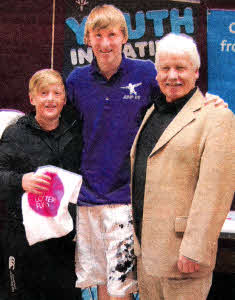 Participants from East Belfast and YI Volunteer from the Collin Area receive Big Lottery Fund t-shirts from Sammy Douglas MLA (DUP, East Belfast)