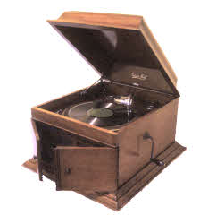 Edison Bell table model gramophone of circa late 1920s. This is pretty much the type of gramophone that many homes would have owned at the time these record sleeves were printed ( you can see one of a similar type at the bottom right of the J.C. Patterson sleeve )