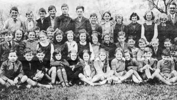 This photo of the class of '39 at Finaghy Public Elementary School with teacher George Power, was submitted by local man Bill McKee who thought it would be good to try and stir up some old memories.