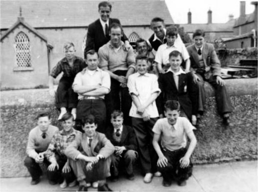 Photograph taken by Annie Hall (Harold Crows future wife) at Greystones 1956. Row 4: from front Harold Crowe, Beano (Billy Hanna).Row 3: Harold Boyd, Jim Campbell, Winston McCausland, Albert McCarter and John Leathem. Row 2: Bobby Chambers (Barrack St.), George Bleakes and Andrew Gibson. Row 1: Peter Ward, Billy McGeown,Terry Watson, Robert Weekes and Albert McLarnon. 