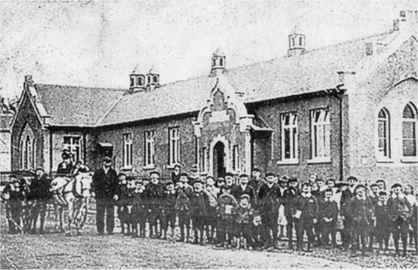 The children of Largymore School line up for the camera in the early days of the century.