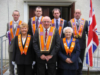 Magheragall District officers pictured prior to the District Service at Magheragall Parish Church last Sunday morning.  L to R: (front row) Edith Gilmore - Deputy Mistress, William Thompson � Worshipful District Master and Sister Peggy Flynn.  (back row) Mark Wood � Deputy Master, Roger Stevenson � Treasurer, Vaughan Hendron � Secretary and Frank McCracken � Past Master.  John Quigley � Lay Reader at Lisburn Cathedral conducted the service.