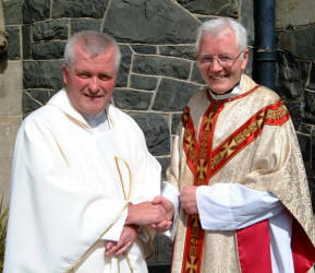The new Parish Priest of Dromore, the Very Rev Patrick J Murray is welcomed to St Colman�s by the Very Rev. Canon Gerard McCrory, P.P. - Magheradroll and Dromara.