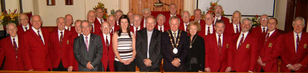 John Lyttle - Conductor, Helena Nicholl - Pianist, the Mayor - Councillor Trevor Lunn, the Mayoress - Mrs Laureen Lunn and the Rev Leslie Spence pictured with the Harlandic Male Voice Choir that sang at the Harvest Thanksgiving service in Glenavy Methodist Church last Sunday evening (15th October). 