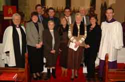 Magherally Parish Choir pictured at a service of Nine Lessons and Carols by Candlelight in Saint John the Evangelist�s, Magherally last Sunday evening (17th December). L to R: (front) The Rev Elizabeth Hanna - Rector, Mary McKay, Josie McRoberts, Joan Bloomer, Margaret Adair, Hilary Menary and Andrew Smyth - Organist. (back row) John Baker, Philip Spratt, Errol Curran and Bertie McRoberts.