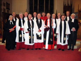 Pictured at the Service of Installation in Lisburn Cathedral on Wednesday 22nd February 2006 are L to R: (front) The Rev. Canon Edgar Turner - Registrar, the Rev. Canon Sam Wright - Treasurer, the Very Rev. John Bond - Dean of Connor, the Rev. Canon Ernest Harris - Prebendary of Cairncastle, the Rt. Rev. Alan Harper - Bishop of Connor, the Rev. Canon George Graham - Prebendary of Connor and Mr. Willoughby Wilson - Diocesan Chancellor.  (back row) The Ven. Stephen McBride - Archdeacon of Connor, the Rev. Canon Percival Walker - Precentor, the Rev. Canon George Irwin - Prebendary of Kilroot, Mr. Alan Whyte - Verger, the Rev. Chancellor Stuart Lloyd - Chancellor, the Rev. Canon William Bell - Prebendary of Rasharkin and the Ven. Patrick Rooke - Archdeacon of Dalriada