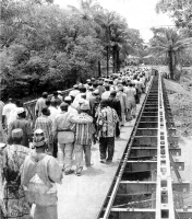 Local people using the new bridge. US38-712SP