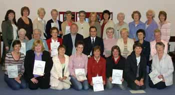 Pictured at a presentation ceremony on Wednesday 16th May are some of the 77 ladies who successfully completed a Health & Safety and Food Hygiene course held recently in the Downtown Centre, First Lisburn Presbyterian Church. Included (centre of second row) are Colin McKay - LDC Chairperson and Robert Lamont - Environmental Health Manager Lisburn City Council and (L to R in back row) course facilitators Margaret Baillie - Downtown Centre Co-ordinator, Mrs Hilary Diamond - Downtown Centre Secretary and Mrs Margaret McIlmoyle - First Lisburn Presbyterian Church Catering Convenor. 