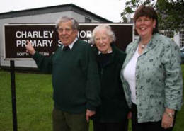 Col Robin Charley points out the name of his grandfather, the late William Charley of Seymour Hill in whose memory the Charley Memorial School was built in 1892. Looking on are his wife Janet and Gwen Forsythe (Principal). The picture was taken at a BBQ in the school last Friday night.