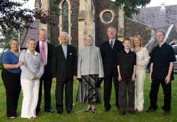 Canon Cochrane and his family pictured at a service marking his final sermon as Senior Minister of Christ Church Parish.  L to R: Eleanor, Emma, Michael, Ken, Mildred, Peter, Christopher, Deardrie and Simon.