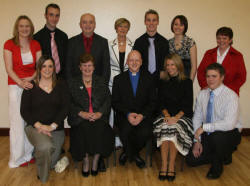At the installation service in Loughaghery Presbyterian Church are L to R: (front row) Zara Patterson, Mrs Loreen Patterson, Rev Leslie Patterson, Laura Graham and Joseph Magill. (back row) Charlene Wilson, Gary Patterson, Colin Patterson, Catherine Patterson, Alan Patterson, Rebekah Morrison and Amanda Patterson.