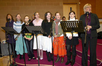 Angela Sofley - Trinity Pastoral Assistant (left) pictured with the Trinity Praise Team L to R: Megan Porter, Amy Pollock, Sian Porter, Vivienne Morrison, Stephanie Portis, Meghan Butler and Barbara Gamble.