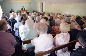 Robert Watson pictured welcoming the large crowd of well-wishers to the final service at Beanstown Mission Hall.
