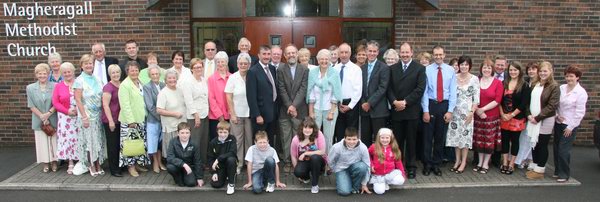  Rev Dr Peter Mercer pictured with the congregation of Magheragall Methodist Church at his first service as their new minister last Sunday morning (2nd August). 