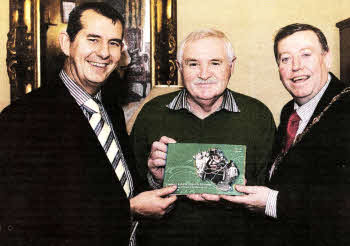 Local churches writer John Kelly with Environment Minister Edwin Poots (left) and Lisburn Mayor Alderman Paul Porter at a pre-Christmas re-launch of 'Lisburn's Rich Church Heritage' in the Mayor's Parlour.