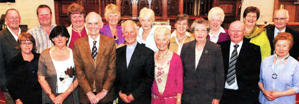 The Very Rev Dr David McGaughey and his wife Anne at morning worship in Railway Street Presbyterian Church with founder members of a youth fellowship which he formed in 1963 during his years as assistant minister. 