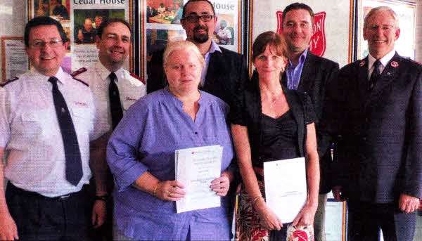 Major Alan Watters, Leader of The Salvation Army in Ireland with Chief Secretary Colonel Brian Peddles (far right) and staff at Centenary House, Captain Neil McFerran, Chaplain, Stephen Potter, Social Worker, Guy Poland, Centre Manager, Elaine Mcllveen, Programme Leader (Care) and Deirdre Conley, Receptionist. The staff were presented with certificates marking their achievements in successfully completing training ad development courses.