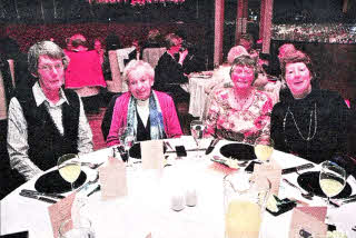 At Legacurry WI's 60th Anniversary dinner are Ann McCullough, Eliza McCleary, Charlotte Irwin, and Shirley Jackson US0811-406PM