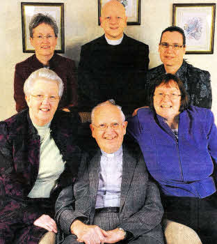 Rev David McConaghy with his wife Maxine and their three daughters Heather, Christine and Sheila. Included is the present minister, the Rev Leslie Patterson. The photo was taken in their home at Anahilt on Sunday morning prior to conducting services at Cargycreevy and Loughaghery Presbyterian Churches marking the 50th Anniversary of Mr McConaghy's Ordination.