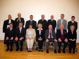 Newly ordained elders pictured with the Commission from the Presbytery of Dromore at Hillhall Presbyterian Church on Sunday 6th November 2005.  L to R: (front row) Russell Andrews, Alan Beattie, Hazel Campbell, Margaret Graham, Winston Graham, James Stewart and Phyllis Walker.  (back row)  The Rev. Jack Richardson - Minister of Hillhall and Acting Clerk of Dromore Presbytery, Rev. Kenneth Smyth - Drumbo Senior Minister, The Rev. Bobby Liddle - Moderator of Dromore Presbytery, Rev. Adrian McLernon - Minister of Drumbo, John Connor - Hillhall Clerk of Session and Representative Elder, Noel Adams - Legacurry Representative Elder and Roy Patterson - Drumbo Representative Elder.