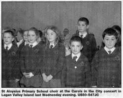 St Aloysius Primary School choir at the Carols in the City concert in Lagan Valley Island last Wednesday evening. US50-547JC