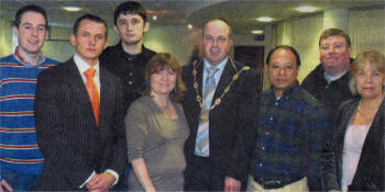 Cllr Paul Given, Daniel Konieczny, Maciek Bator, Fiona McCausland, Deputy Mayor of Lisburn Jim Tinsley, Patrick Yu, Alderman Paul Porter and Maureen Bruce Health Development worker. US0507-521C0