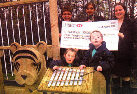 Parkview Primary School Principal Muriel Martin receives a cheque of �4793 from Angell Jairath and Jane Cowley of HSBC bank. Included are Parkview pupils Emma-Jane Skelton and Tyler Jackson. US4707-102A0 Picture By; Aidan O'Reilly