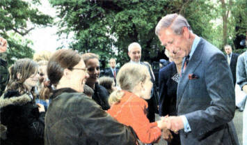 The Prince of Wales meets a young a young admirer at St. Catherine's Church in Aldergrove.