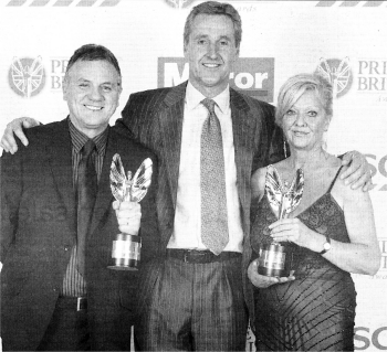 Newsreader Mark Austin with Peter Lachanudis and Susan Porter