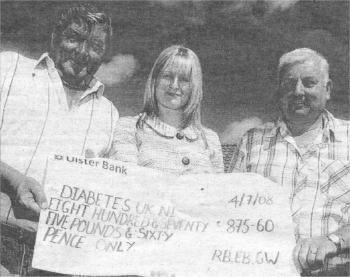 Geordie Wilkinson and Russell Beck presenting a cheque for �875 to Jennie McGiven', National Fundraising Manager for Diabetes UK Northern Ireland.