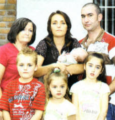 The Coyle family, from Dundrod, who had their holiday in Newcastle ruined when their caravan flooded as a result of last weekend's torrential rain. US3408-525cd