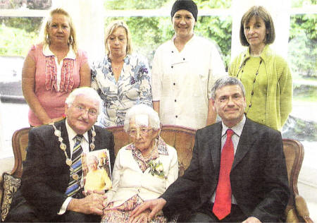 Lisburn Mayor Ronnie Crawford and staff of Parklands pictured with Eileen Bacon on her 100th Birthday at Parklands Nursing Home on Tuesday. US3408-117A0 Picture By: Aidan O'Reilly