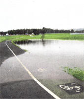 The flooded footpath and cycletrack at Laurelhill, Lisburn Pic by Robert Wilkinson