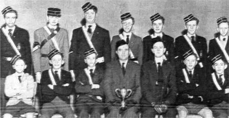 Third Lisburn Company Boys Brigade (Sloan Street Presbyterian) are celebrating their Diamond Jubilee this year. The photograph shows the drill squad who won the local district drill competition at the first attempt in 1959. Back row (left to right): Nigel Brown, Bert Downing, Mervyn Gibson, Robin Campbell, Merril Morrow, Mervyn Bryson and Graham Irvine. Front row (Left to right) Kenneth McCoosh, Desmond Bryson, David Irvine, Robert Frazer (Captain), Robin Irvine (Lieutenant), George Christie and Leslie Clarke.