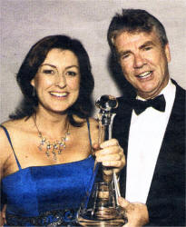 BBC NI's Donna Traynor congratulates Diageo's Terry Loughins on being named 'Hospitality Hero 2008'